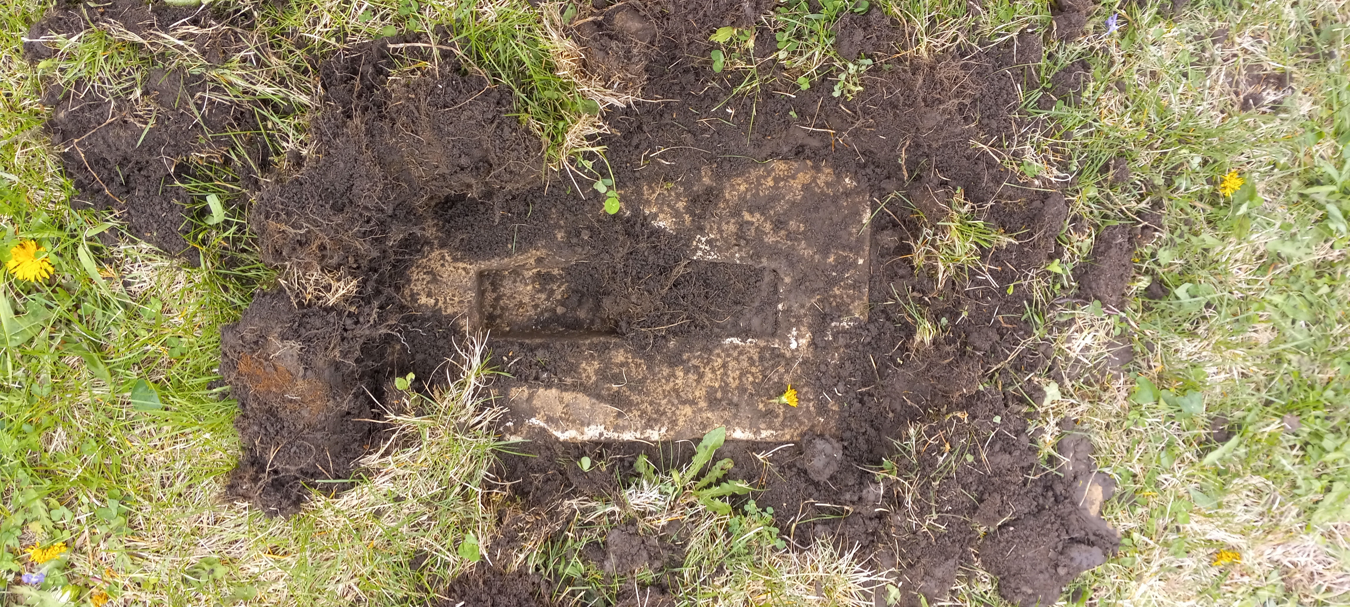 Headstone base discovered, but no headstone.