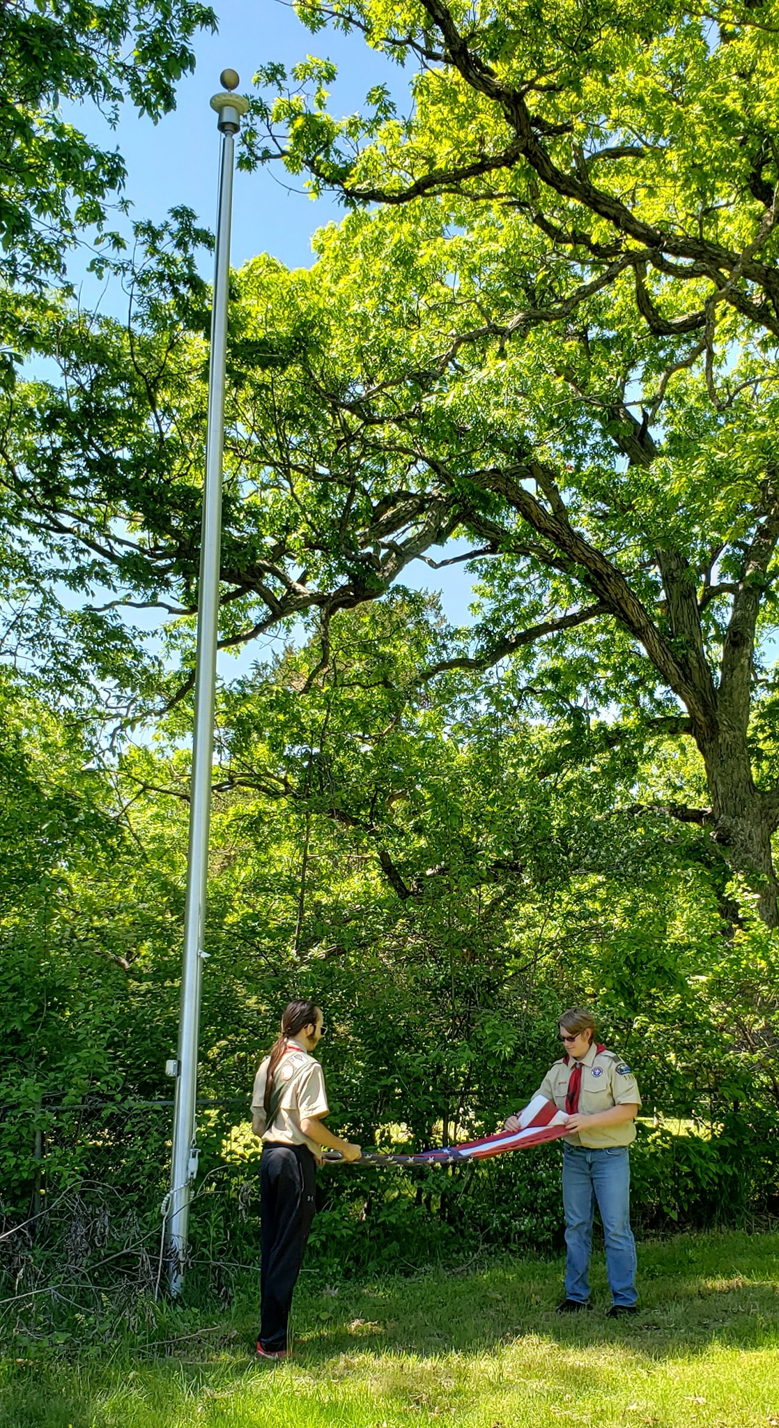 Folding of the old flag at Smith Cemetery.  Photo courtesy of: Kimberly Smith